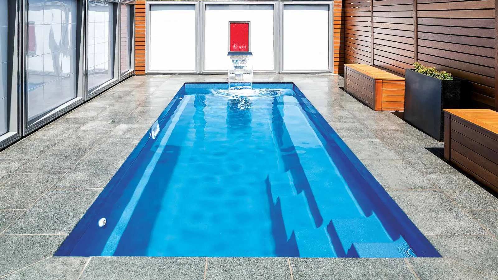 The Esprit™, a fiberglass pool design manufactured by Leisure Pools