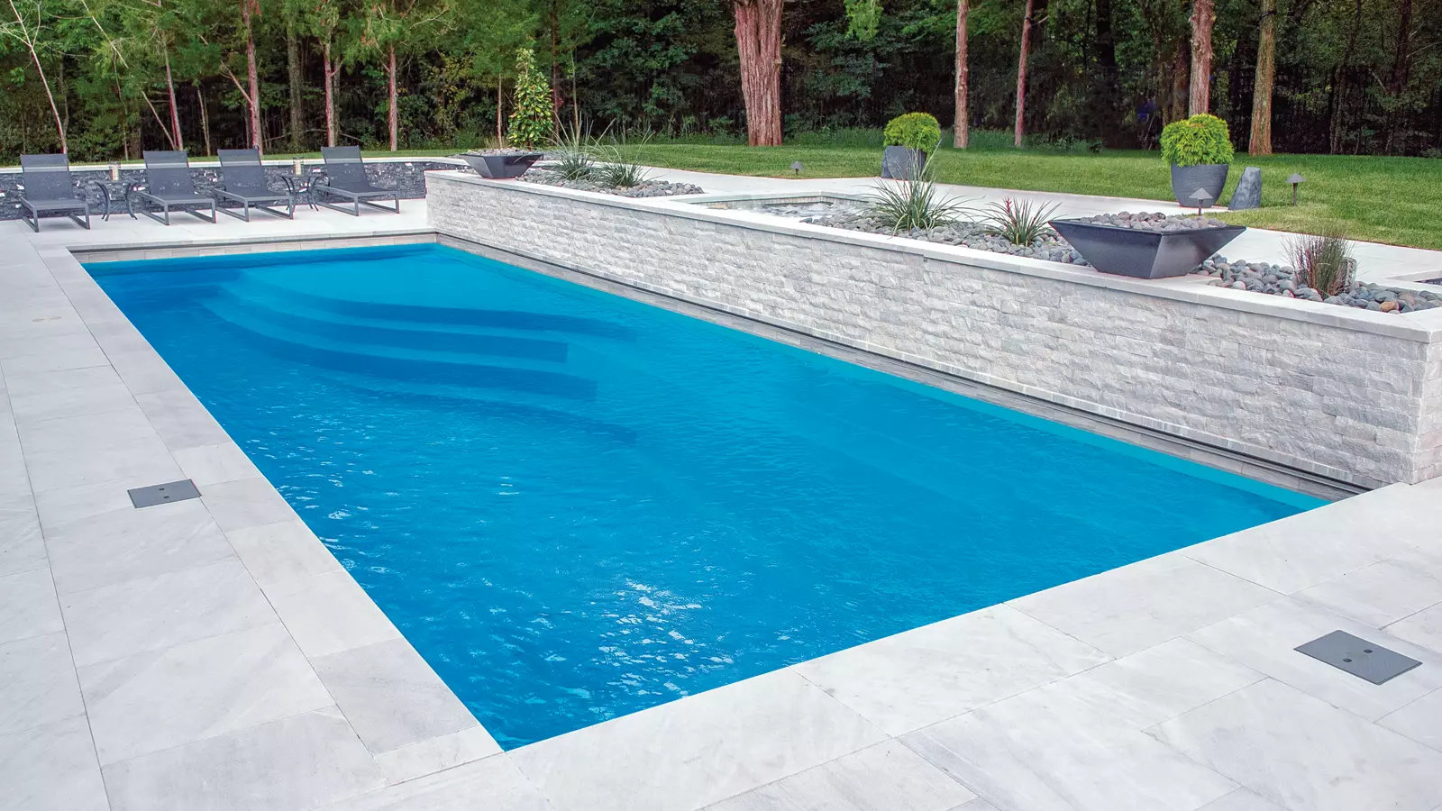Leisure-Pools-Wave-Fiberglass-Pool-Shape The Wave™, a fiberglass pool design manufactured by Leisure Pools